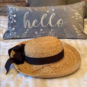 Scala of Italy straw hat with a black band.